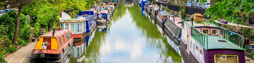 row of moored narrow boats Collidge & Partners